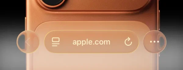 iOS 26 の Safari のアドレスバー。コントラストが弱く、ドメイン名が読みづらくなっている。